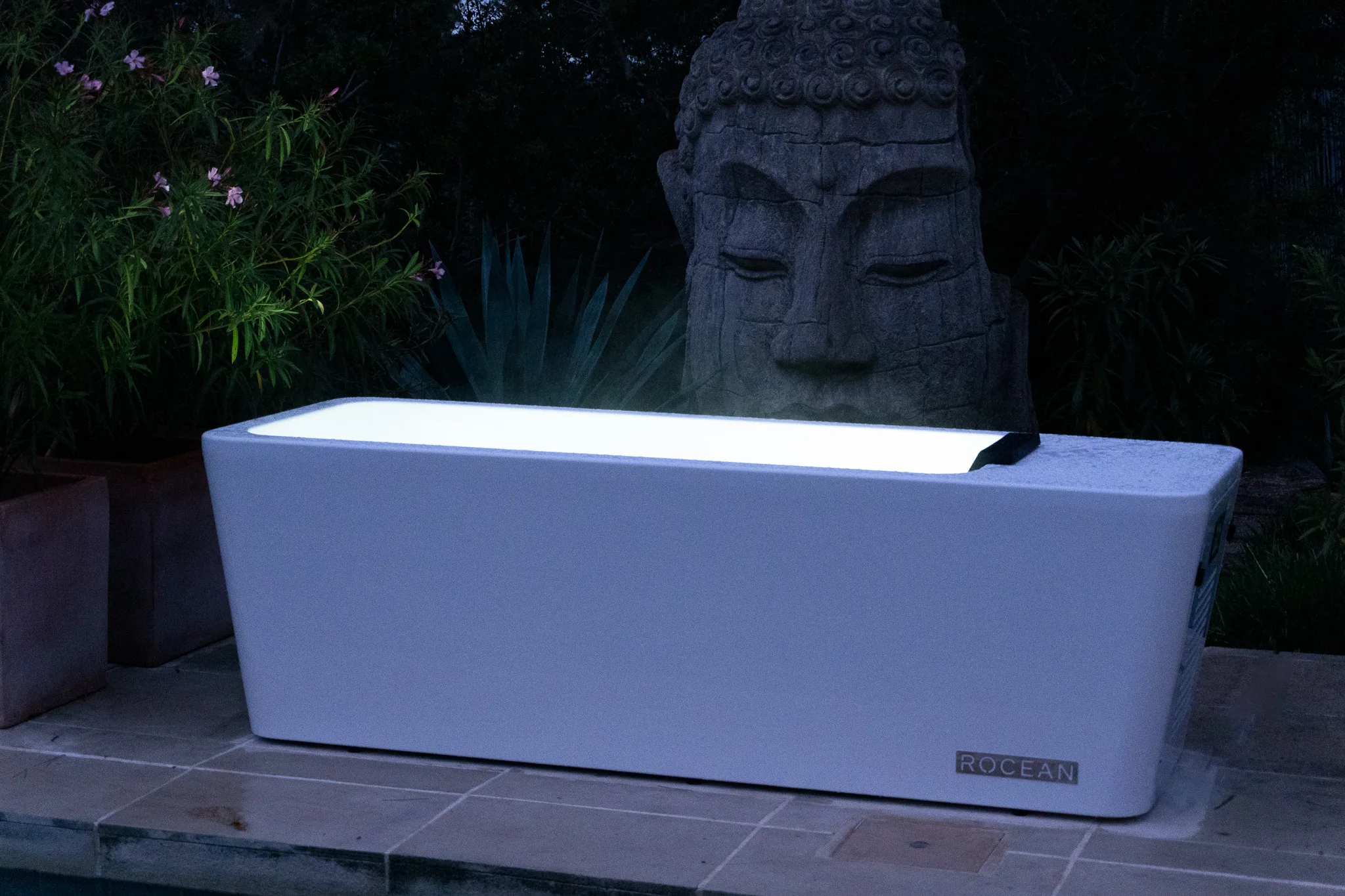 Rocean bath lit at night